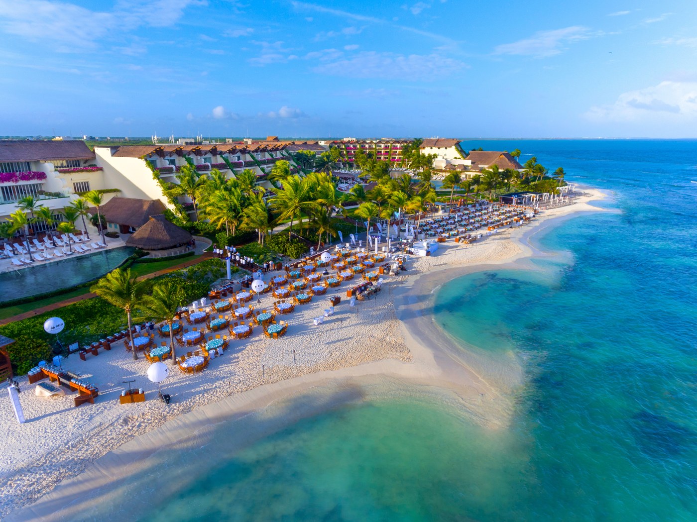 Aerial view of Grand Velas Riviera Maya overlooking its beach and the Caribbean Sea